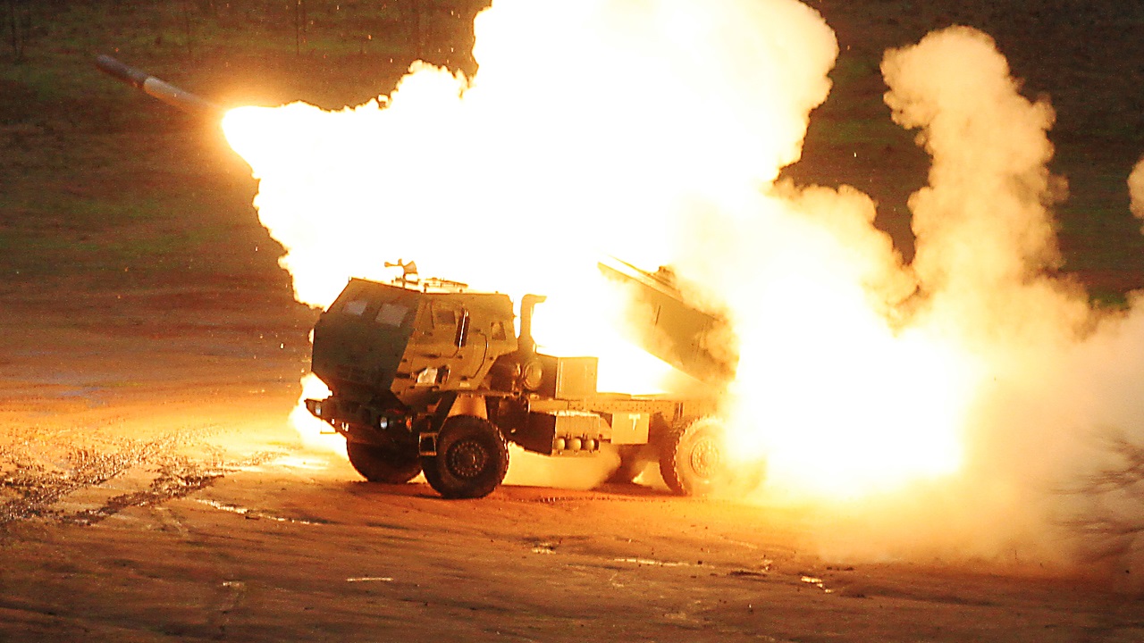 U.S. Marines with 1st Battalion, 11th Marine Regiment, fire a M142 High Mobility Artillery Rocket System (HIMARS), a truck mounted multiple-rocket launcher system, during exercise Steel Knight at Marine Corps Base Camp Pendleton, Calif., Dec. 13, 2012. The battalion conducted this historic live-fire exercise, simultaneously utilizing HIMARS, M777 Lightweight Howitzer and Expeditionary Fire Support System. This is the first time all three artillery weapons systems were fired during the same exercise. (DoD photo by LCpl Joseph Scanlan, U.S. Marine Corps/Released)