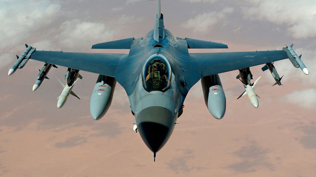 A U.S. Air Force F-16 Fighting Falcon flies a mission in the skies near Iraq on March 22, 2003 during Operation Iraqi freedom. The plane is armed with HARM missiles. Image Credit: Creative Commons.