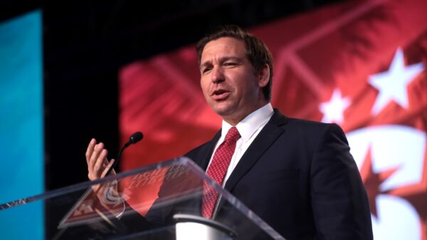 Governor-elect Ron DeSantis speaking with attendees at the 2018 Student Action Summit hosted by Turning Point USA at the Palm Beach County Convention Center in West Palm Beach, Florida. Image by Gage Skidmore.