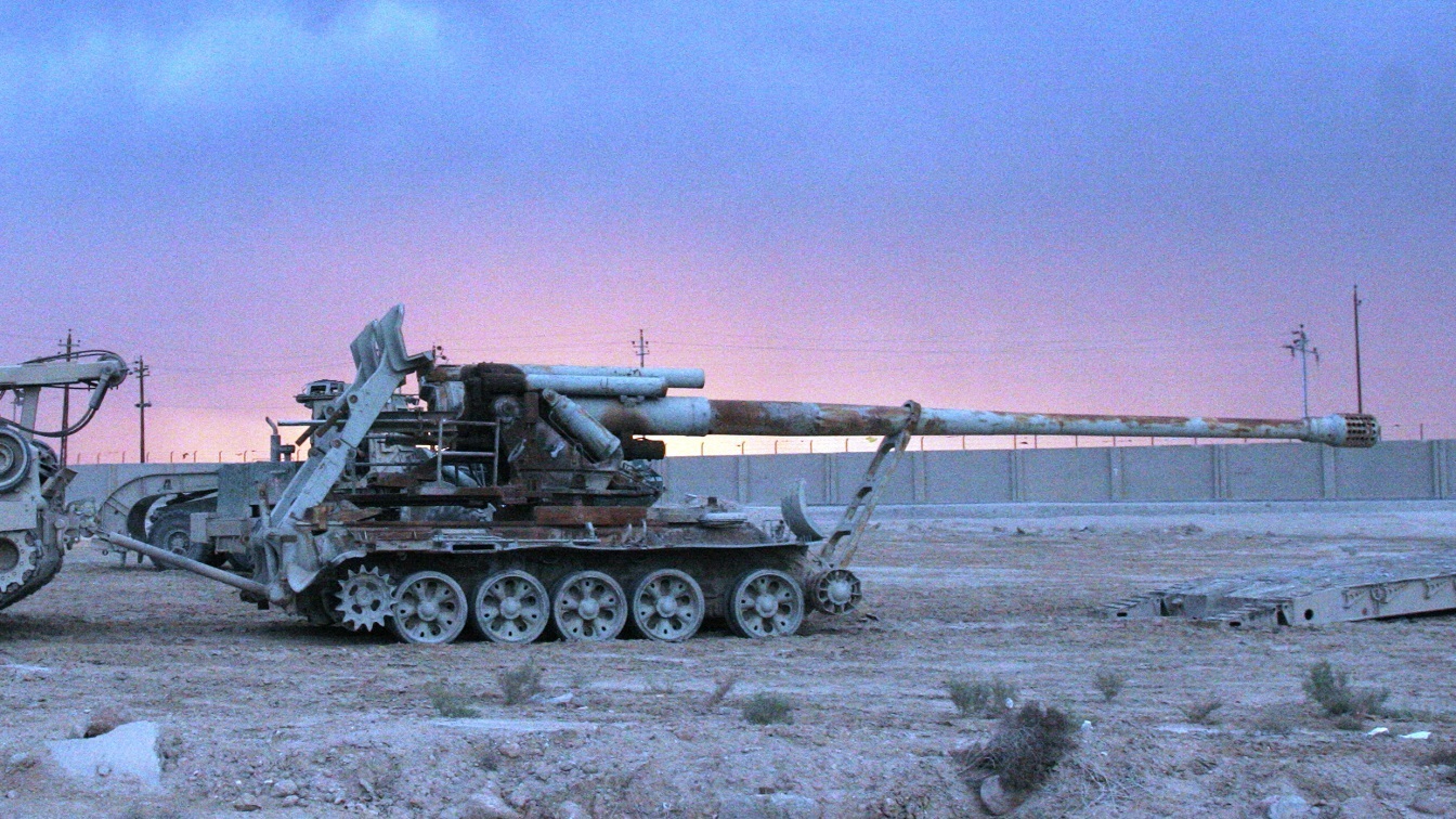 U.S. Marines assigned to Regimental Combat Team 1 use an M-88A2 Hercules recovery vehicle to remove a damaged Iraqi self-propelled artillery piece from the Al Anbar University campus in Ramadi, Iraq, Nov. 29, 2008, during a tank removal mission. Marines are removing the tank as part of the ongoing effort to rebuild Iraq and beautify the country. (U.S. Marine Corps photo by Lance Cpl. Albert F. Hunt/Released)