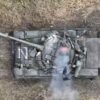 A Russian tank under attack by a drone from Ukraine. Image Credit: YouTube/Ukrainian military.