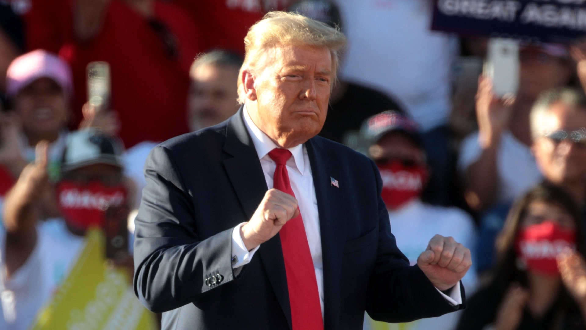 President of the United States Donald Trump dancing at the conclusion of a "Make America Great Again" campaign rally at Phoenix Goodyear Airport in Goodyear, Arizona.