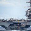 221013-N-LK647-1031 ATLANTIC OCEAN—A view of the first-in-class aircraft carrier USS Gerald R. Ford (CVN 78) from aboard the Ticonderoga-class guided-missile cruiser USS Normandy (CG 60) as Normandy participates in a Tactical Force Exercise as part of the Gerald R. Ford Carrier Strike Group, Oct. 13, 2022. Ford is on its inaugural deployment conducting training and operations alongside NATO Allies and partners to enhance integration for future operations and demonstrate the U.S. Navy’s commitment to a peaceful, stable and conflict-free Atlantic region. (U.S. Navy photo by Mass Communication Specialist 2nd Class Malachi Lakey)