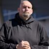 Lt. Gov. John Fetterman listening to speakers. Image Credit: Creative Commons.