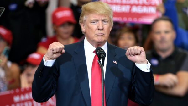 Donald Trump speaking with supporters at a campaign rally at the Phoenix Convention Center in Phoenix, Arizona. By Gage Skidmore.