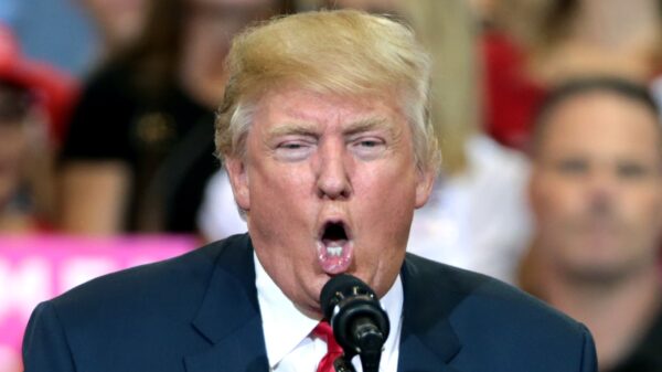 Donald Trump speaking with supporters at a campaign rally at the Phoenix Convention Center in Phoenix, Arizona. Image Credit: Gage Skidmore.