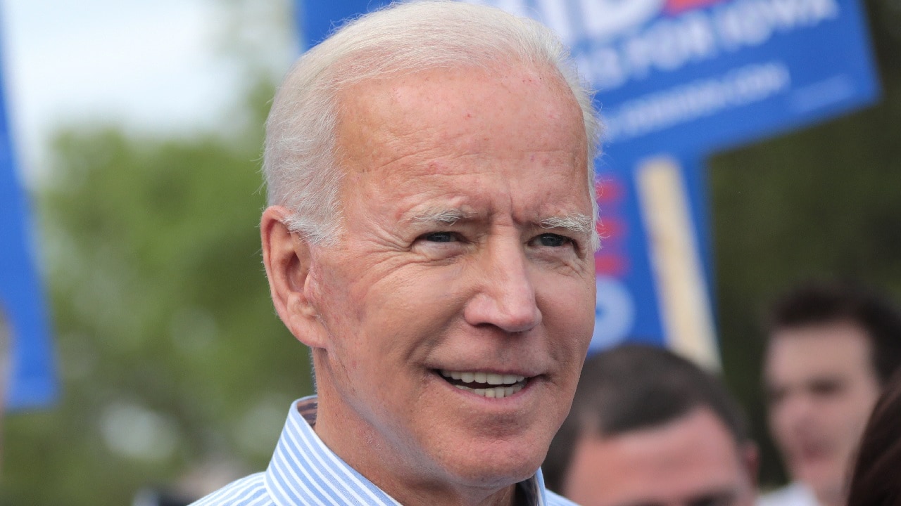 Former Vice President of the United States Joe Biden walking with supporters at a pre-Wing Ding march from Molly McGowan Park in Clear Lake, Iowa. Image Credit: Creative Commons.