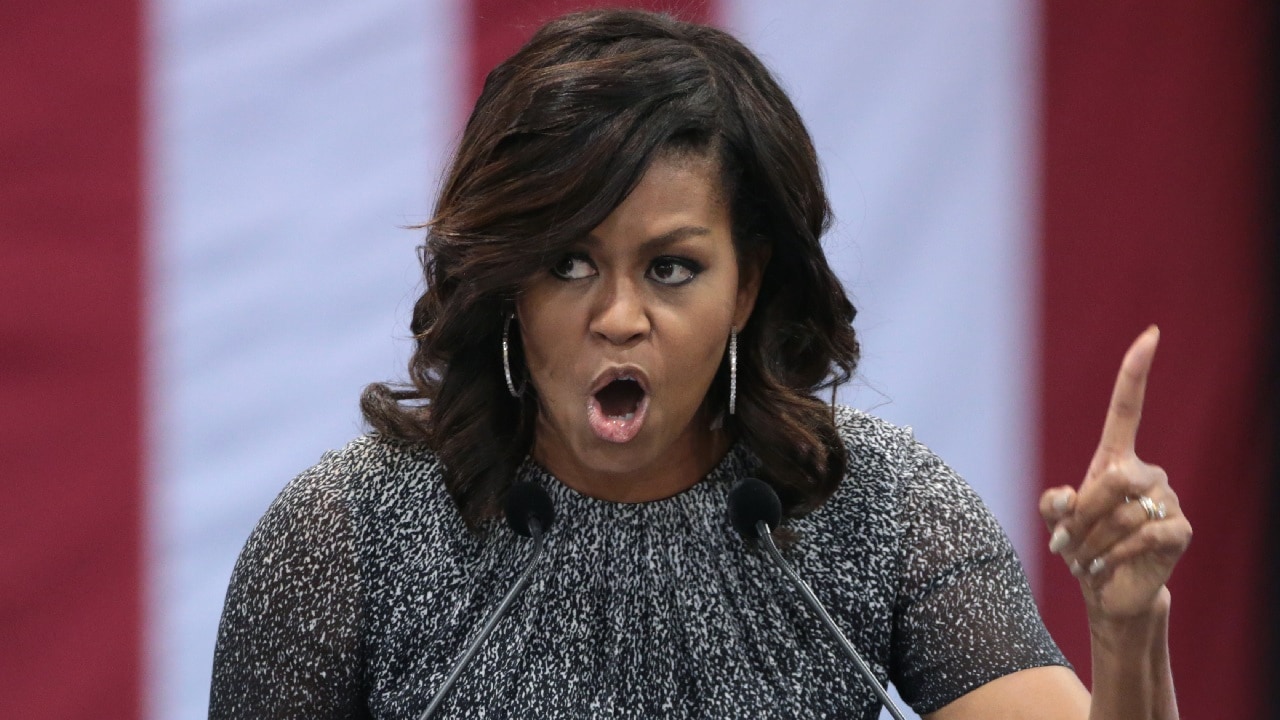 First Lady of the United States Michelle Obama speaking with supporters of former Secretary of State Hillary Clinton at a campaign rally at the Phoenix Convention Center in Phoenix, Arizona. By Gage Skidmore.