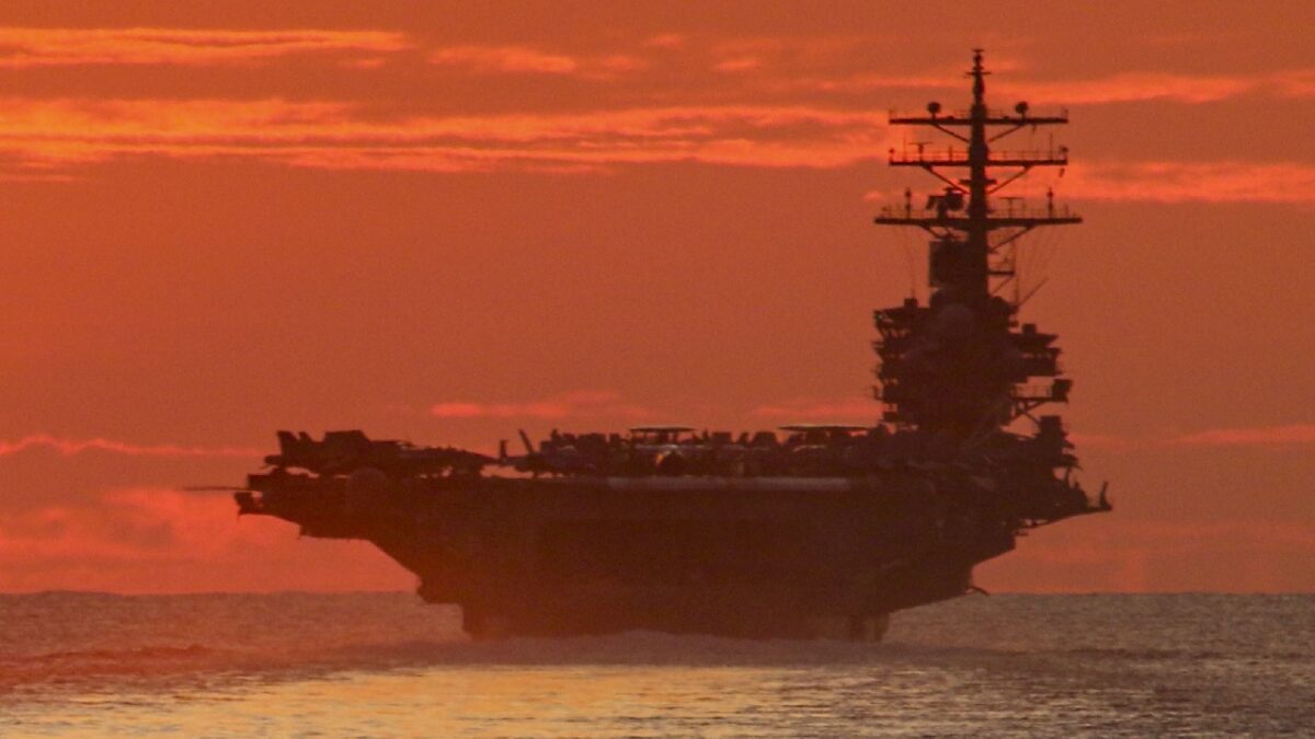 STRAIT OF MALACCA (June 18, 2021) The Navy’s only forward-deployed aircraft carrier USS Ronald Reagan (CVN 76) transits the South China Sea with the Arleigh Burke-class guided missile destroyer USS Halsey (DDG 97) and the Ticonderoga-class guided-missile cruiser USS Shiloh (CG 67). Reagan is part of Task Force 70/Carrier Strike Group 5, conducting underway operations in support of a free and open Indo-Pacific. (U.S. Navy Photo by Mass Communication Specialist 1st Class Rawad Madanat)