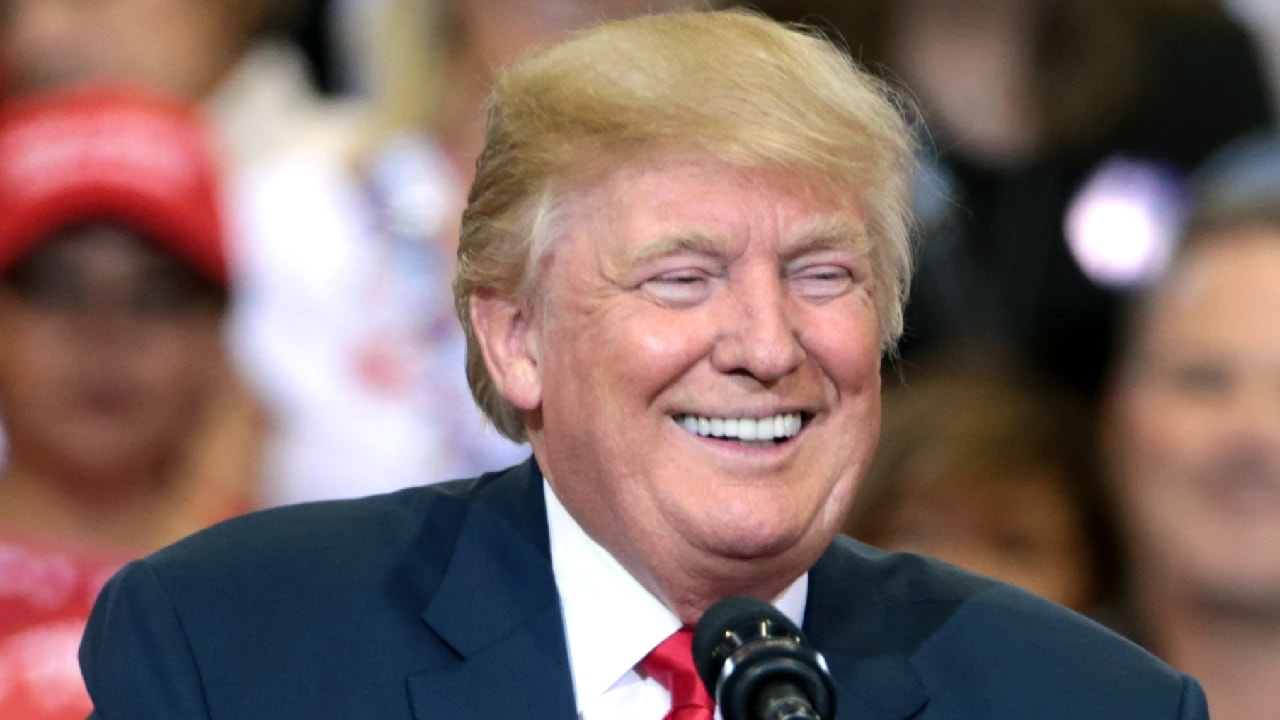 Donald Trump speaking with supporters at a campaign rally at the Phoenix Convention Center in Phoenix, Arizona. Image by Gage Skidmore.