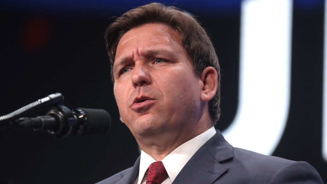 Governor Ron DeSantis speaking with attendees at a "Unite & Win Rally" at Arizona Financial Theatre in Phoenix, Arizona. Image by Gage Skidmore.