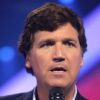Tucker Carlson speaking with attendees at the 2022 AmericaFest at the Phoenix Convention Center in Phoenix, Arizona. By Gage Skidmore.
