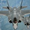 F-35 Lightning II aircraft receive fuel from a KC-10 Extender from Travis Air Force Base, Calif., July 13, 2015, during a flight from England to the U.S. The fighters were returning to Luke AFB, Ariz., after participating in the world's largest air show, the Royal International Air Tattoo. (U.S. Air Force photo/Staff Sgt. Madelyn Brown)