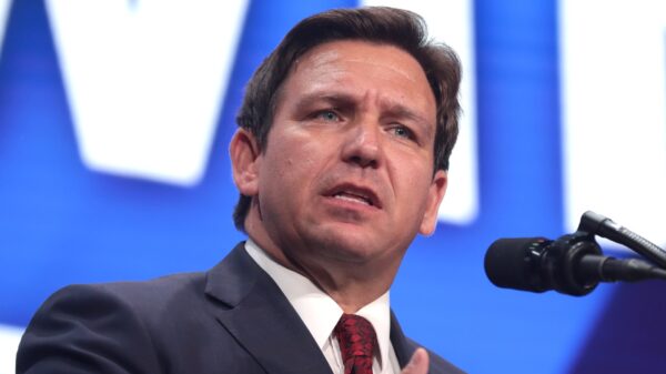 Governor Ron DeSantis speaking with attendees at a "Unite & Win Rally" at Arizona Financial Theatre in Phoenix, Arizona. Image Credit: Gage Skidmore.