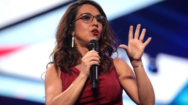 By Gage Skidmore: U.S. Congresswoman Lauren Boebert speaking with attendees at the 2021 AmericaFest at the Phoenix Convention Center in Phoenix, Arizona.