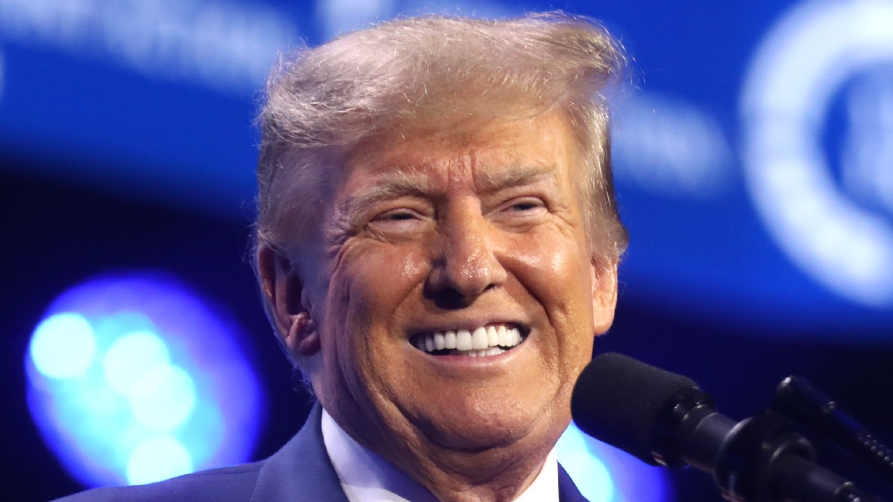 Former President of the United States Donald Trump speaking with attendees at the 2023 Turning Point Action Conference at the Palm Beach County Convention Center in West Palm Beach, Florida. By Gage Skidmore.