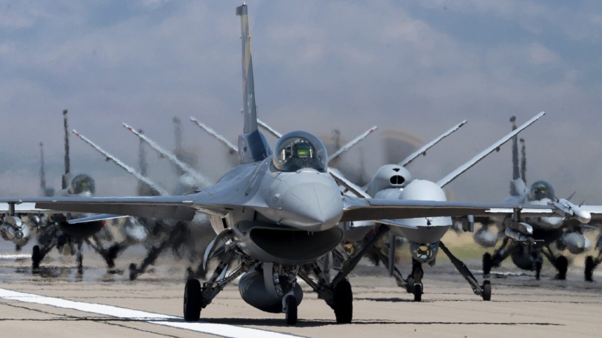 Forty-nine F-16 Vipers and MQ-9 Reapers assigned to the 49th Wing line up on the runway during an elephant walk at Holloman Air Force Base, New Mexico, April 21, 2023. The 49th Wing is the Air Force’s largest F-16 and MQ-9 formal training unit, building combat aircrew pilots and sensor operators ready for any future conflicts. (U.S. Air Force photo by Tech. Sgt. Victor J. Caputo)