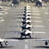 U.S. Air Force F-22 Raptors, E-3 Sentrys, C-17 Globemaster IIIs, C-130J Herculeses and C-12F Hurons participate in a close formation taxi known as an elephant walk at Joint Base Elmendorf-Richardson, Alaska, May 5, 2020. This event displayed the ability of the 3rd Wing, 176th Wing and the 477th Fighter Group to maintain constant readiness throughout COVID-19 by Total Force Integration between active-duty, Guard and Reserve units to continue defending the U.S. homeland and ensuring a free and open Indo-Pacific. (U.S. Air Force photo by Senior Airman Jonathan Valdes Montijo)