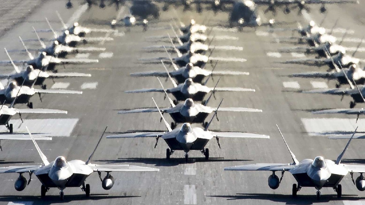 U.S. Air Force F-22 Raptors, E-3 Sentrys, C-17 Globemaster IIIs, C-130J Herculeses and C-12F Hurons participate in a close formation taxi known as an elephant walk at Joint Base Elmendorf-Richardson, Alaska, May 5, 2020. This event displayed the ability of the 3rd Wing, 176th Wing and the 477th Fighter Group to maintain constant readiness throughout COVID-19 by Total Force Integration between active-duty, Guard and Reserve units to continue defending the U.S. homeland and ensuring a free and open Indo-Pacific. (U.S. Air Force photo by Senior Airman Jonathan Valdes Montijo)