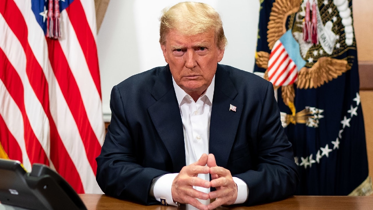 President Donald J. Trump, joined by Chief of Staff Mark Meadows, participates in a phone call with Vice President Mike Pence, Secretary of Defense Mark Esper, Secretary of State Mike Pompeo, Chairman of the Joint Chiefs of Staff Gen. Mark Milley and National Security Advisor Robert O’Brien Sunday, Oct. 4, 2020, in his conference room at Walter Reed National Military Medical Center in Bethesda, Md. (Official White House Photo by Tia Dufour)