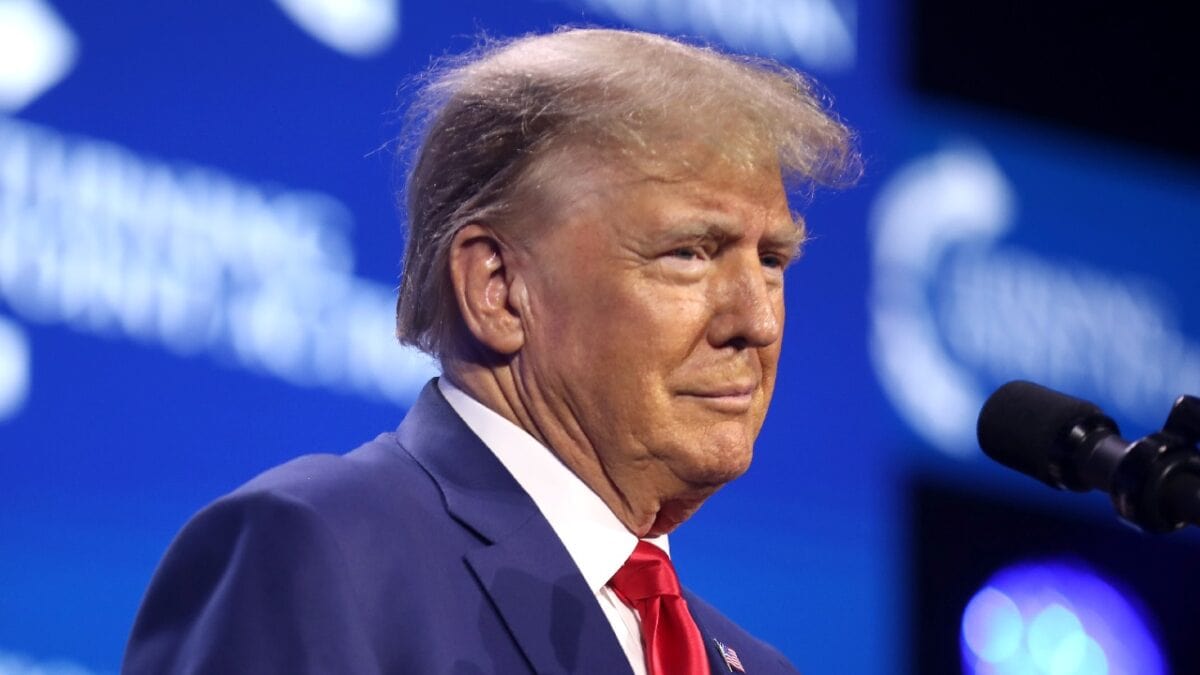 Former President of the United States Donald Trump speaking with attendees at the 2023 Turning Point Action Conference at the Palm Beach County Convention Center in West Palm Beach, Florida.