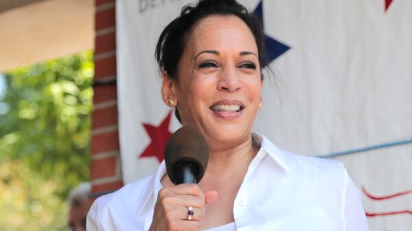 U.S. Senator Kamala Harris speaking with supporters at the annual West Des Moines Democratic Party Summer picnic at Legion Park in West Des Moines, Iowa. By Gage Skidmore.