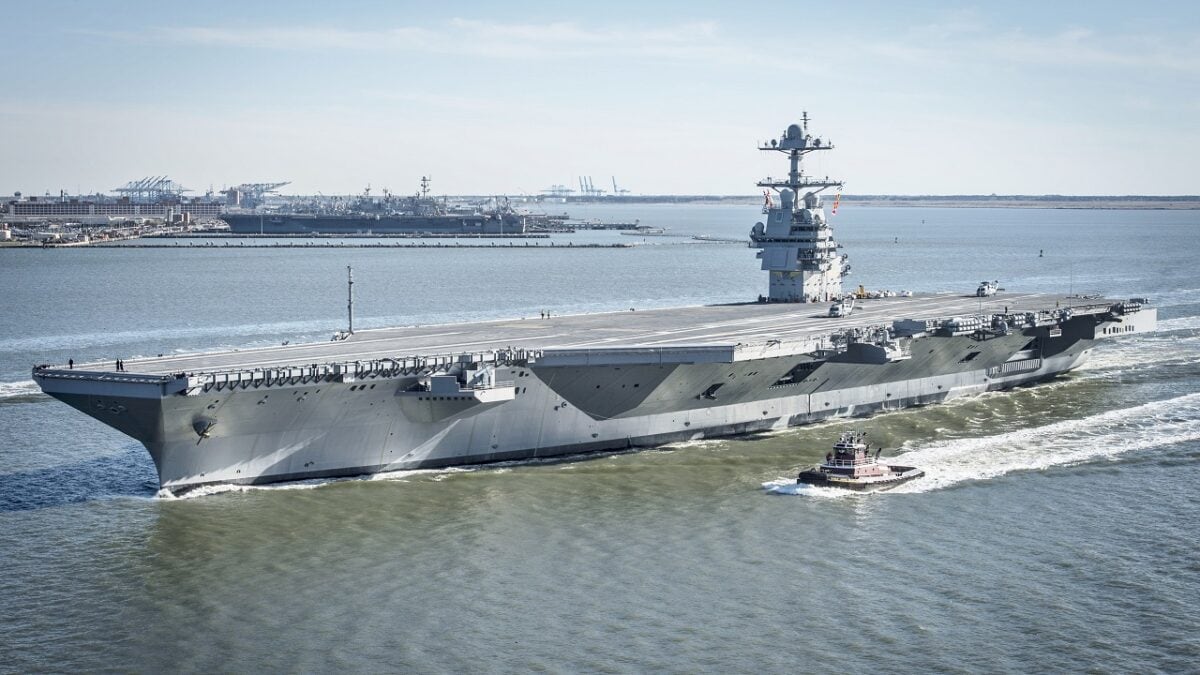 The U.S. Navy aircraft carrier USS Gerald R. Ford (CVN-78) underway under her own power for the first time while leaving Newport News Shipbuilding, Newport News, Virginia (USA), on 8 April 2017. The first-of-class ship – the first new U.S. aircraft carrier design in 40 years – spent several days conducting builder's sea trials, a comprehensive test of many of the ship's key systems and technologies. USS George Washington (CVN-73) and the amphibious assault ship USS Kearsarge (LHD-3) are visible in the background.
