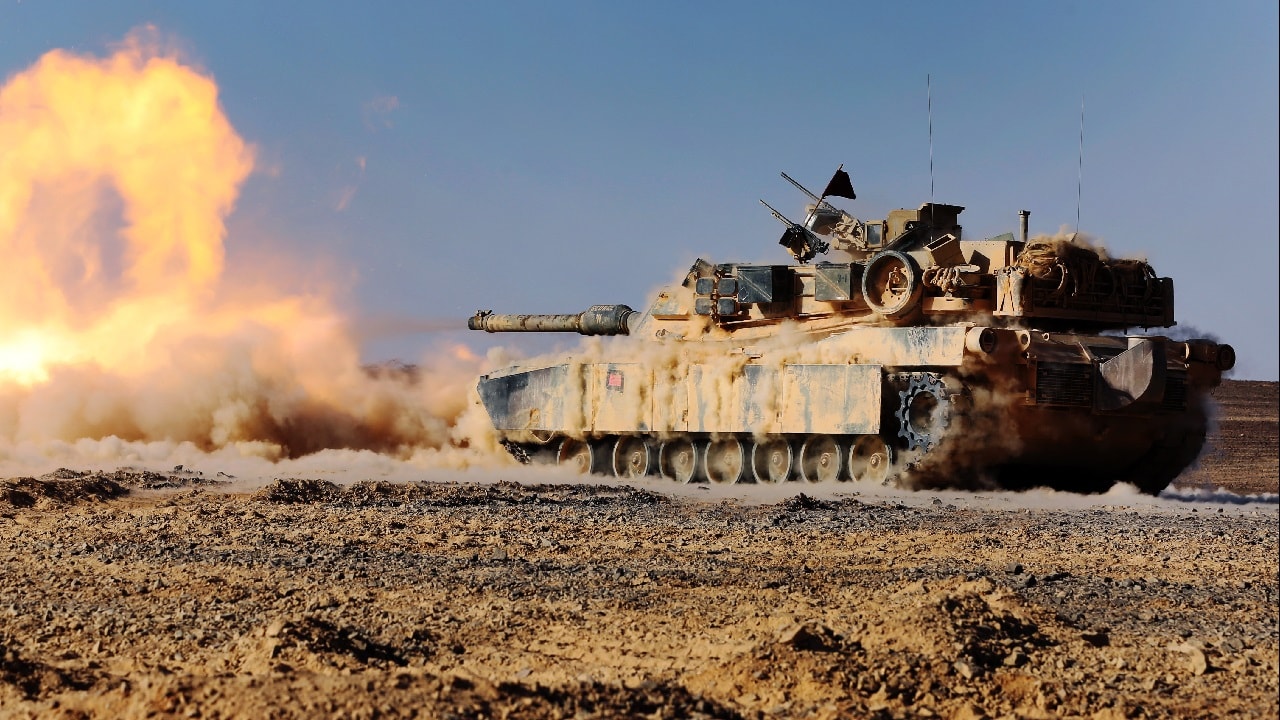 An M1A1 Abrams Main Battle Tank with 24th Marine Expeditionary Unit, fires its 120 mm smoothbore cannon during a live-fire event as part of Exercise Eager Lion 2015 in Jordan, May 9, 2015. Eager Lion is a recurring multinational exercise designed to strengthen military-to-military relationships, increase interoperability between partner nations, and enhance regional security and stability. This is similar to U.S. tanks given to Ukriane. Image: Creative Commons.