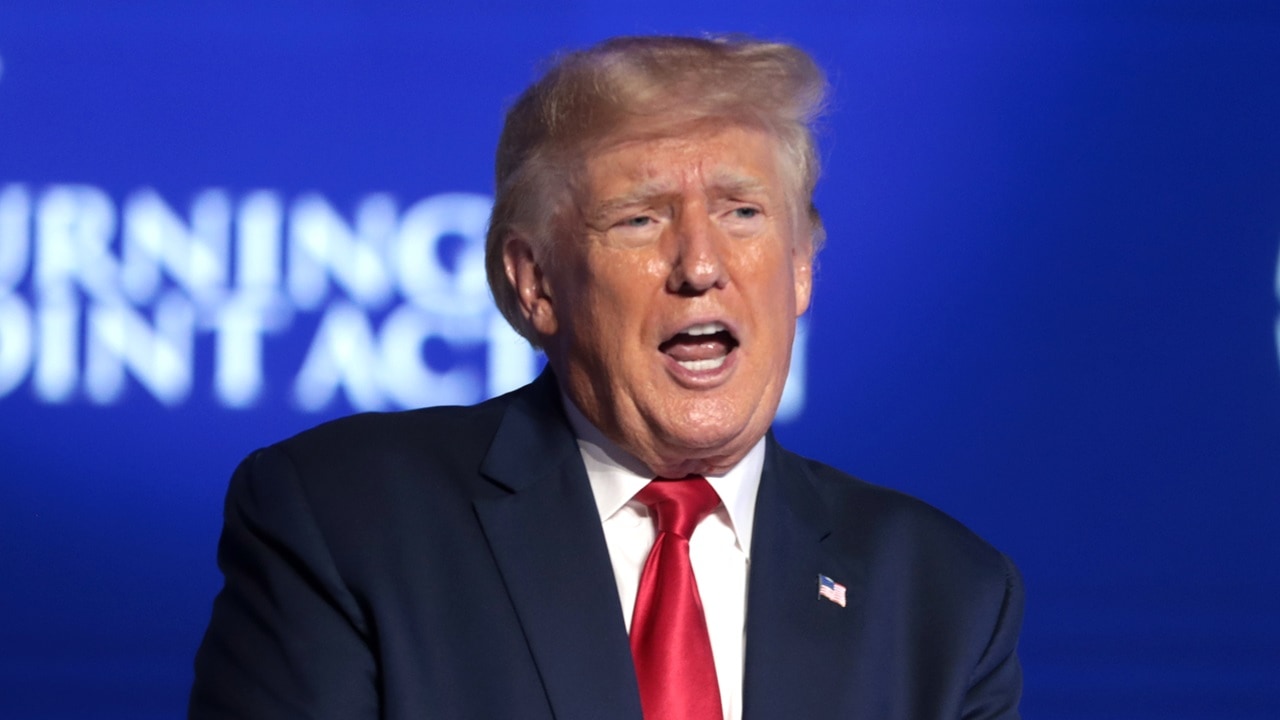 Former President of the United States Donald Trump speaking with attendees at the 2022 Student Action Summit at the Tampa Convention Center in Tampa, Florida. By Gage Skidmore.