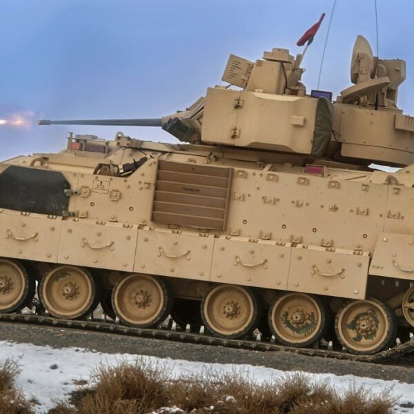 The Bradley Fighting Vehicle cuts loose several rounds from the 25mm main gun on the orchard Combat Training Center Range.