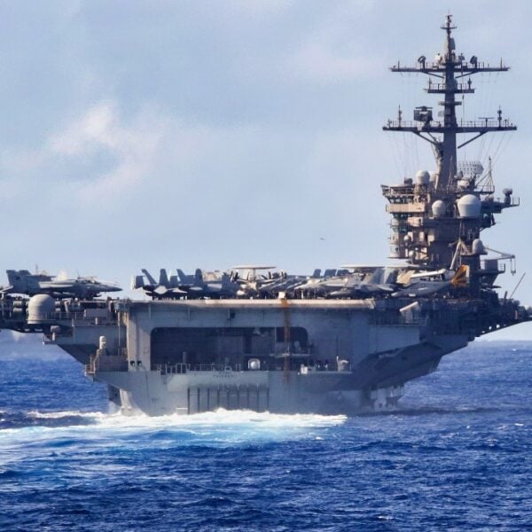 Navy Aircraft Carrier in the Ocean Sailing.