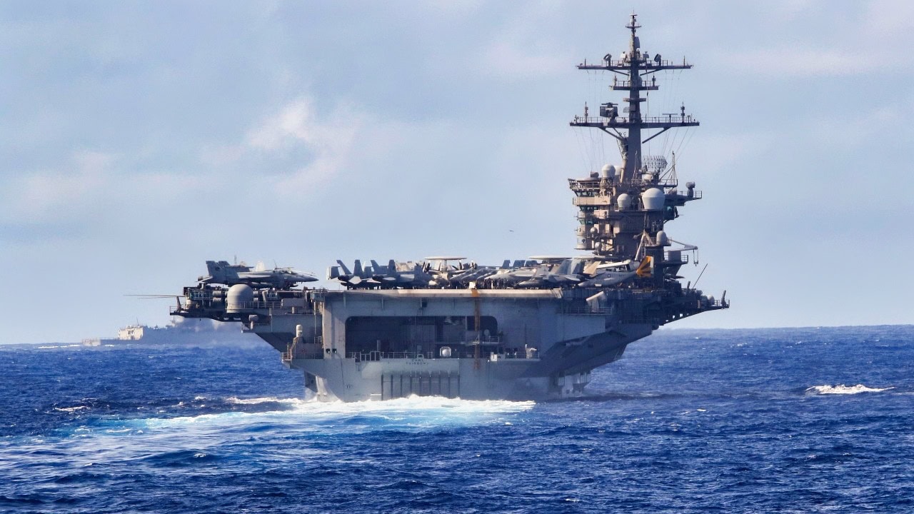 Navy Aircraft Carrier in the Ocean Sailing.