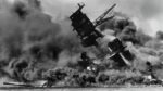 The USS Arizona (BB-39) burning after the Japanese attack on Pearl Harbor, 7 December 1941.