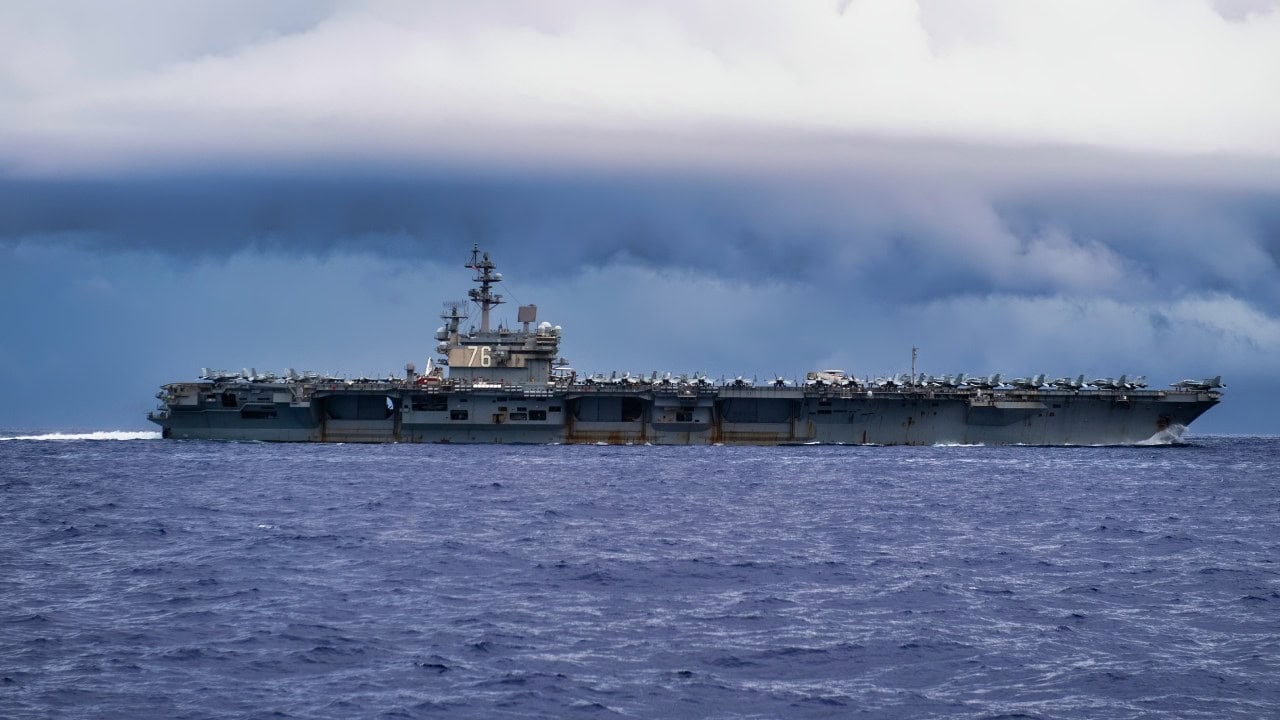 (Sept. 14, 2020) The aircraft carrier USS Ronald Reagan (CVN) 76 steams ahead during exercise Valiant Shield 2020. Valiant Shield is a U.S. only, biennial field training exercise (FTX) with a focus on integration of joint training in a blue-water environment among U.S. forces. This training enables real-world proficiency in sustaining joint forces through detecting, locating, tracking, and engaging units at sea, in the air, on land, and in cyberspace in response to a range of mission areas. (U.S. Navy photo by Mass Communication Specialist 2nd Class Nick Bauer)