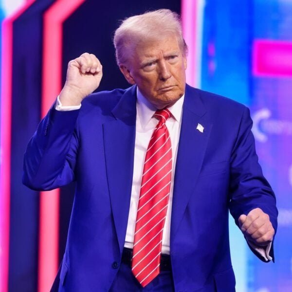 President-elect of the United States Donald Trump speaking with attendees at the 2024 AmericaFest at the Phoenix Convention Center in Phoenix, Arizona.