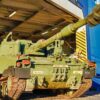 A U.S. M109 Paladin howitzer drives off the vessel Liberty Peace during offloading operations at the port of Koper, Slovenia on December 28, 2024. This Reception, Staging, and Onward Movement (RSOM) operation in the port of Koper is bringing in 1-3ID, the next Regionally Aligned Force (RAF), into the European Theater. These forces will be then transported by the 21st Theater Sustainment Command to their forward operating sites across NATO where they will conduct interoperability training with Allies and partners. The intent of these RAFs is to assure our allies and deter all adversaries.