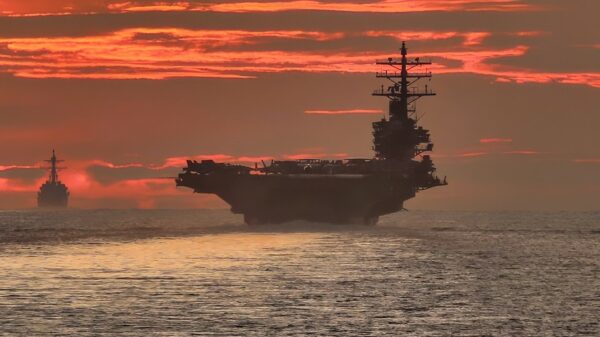210618-N-JW440-2165 STRAIT OF MALACCA (June 18, 2021) As seen from the Ticonderoga-class guided-missile cruiser USS Shiloh (CG 67), the Navy’s only forward-deployed aircraft carrier USS Ronald Reagan (CVN 76) transits the South China Sea with the Arleigh Burke-class guided missile destroyer USS Halsey (DDG 97). The ships are part of Task Force 70/Carrier Strike Group 5, conducting underway operations in support of a free and open Indo-Pacific. (U.S. Navy Photo by Mass Communication Specialist 1st Class Rawad Madanat)