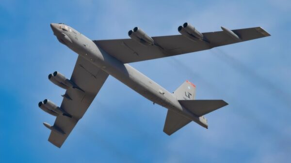 A U.S. Air Force B-52 Stratofortress aircraft, assigned to the 96th Bomb Squadron from Barksdale Air Force Base, Louisiana, flies over spectators at the Dubai Airshow 2025, Nov. 17, 2025, at the Al Maktoum International Airport in Dubai, United Arab Emirates. The B-52 flew from Rota, Spain, to participate in the event, showcasing U.S. airpower on a global stage. (U.S. Air Force photo by Staff Sgt. Tylin Rust)