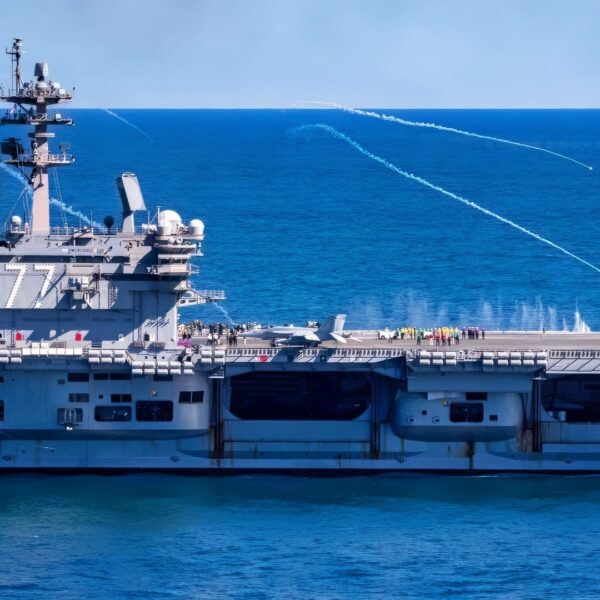 (Oct. 5, 2025) An MH-60S Sea Hawk attached to the “Dusty Dogs” of the Helicopter Sea Combat Squadron (HSC) 7 fires flares above the Nimitz-class aircraft carrier USS George H.W. Bush (CVN 77) in support of the Titans at Sea Presidential Review. The Titans of the Sea Presidential Review is one of many events taking place throughout the country to showcase maritime capabilities as part of the U.S Navy’s 250th birthday. America is a maritime nation. For 250 years, America’s Warfighting Navy has sailed the globe in defense of freedom. (U.S. Navy photo by Mass Communication Specialist 2nd Class Mitchell Mason)