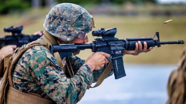 U.S. Marine Corps Lance Cpl. Elijah Geiwitz fires an M4 carbine in the short bay during a live-fire rifle range for the combat marksmanship course on Camp Hansen, Okinawa, Japan, March 13, 2025. CMC refines Marines marksmanship fundamentals and enhances their lethality through advanced marksmanship training. Geiwitz, a native of Wisconsin, is an automotive maintenance technician with 3rd Landing Support Battalion, 3rd Marine Logistics Group. (U.S. Marine Corps photo by Cpl. Michael Taggart)
