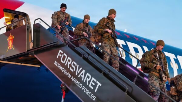 U.S. Marines with 2nd Battalion, 6th Marine Regiment, 2nd Marine Division, deplane from a Boeing 767-300ER commercial aircraft for Exercise Cold Response 26 in Bardufoss, Norway, Jan. 19, 2026. Exercise CORE 26 is a Norwegian-led winter military exercise designed to enhance collective defense capabilities and ensure U.S. readiness to rapidly deploy and seamlessly operate alongside NATO Allies in challenging arctic conditions. (U.S. Marine Corps photo by Cpl. Judith Ann Lazaro)