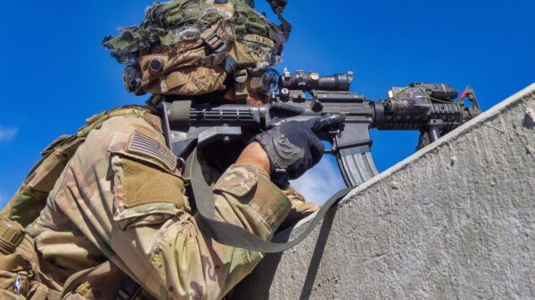 U.S. Army Soldier Pfc. Eric Rivera, assigned to Delta Troop, 1st Platoon, Multipurpose Company, 3rd Squadron, 4th Cavalry Regiment, 3rd Mobile Brigade, 25th Infantry Division, pulls security before a Ghost-X drone conducts reconnaissance. The mission was part of the Joint Pacific Multinational Readiness Center Rotation 26-01, which integrated U.S. forces, multinational partners, and joint capabilities to train tactics, techniques, and procedures required to dominate jungle and archipelagic terrain during large-scale combat operations. (U.S. Army photo by Pfc. Jose Nunez)