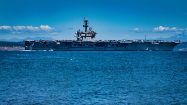 Aircraft carrier USS Theodore Roosevelt (CVN 71) passes Fort Worden before its arrival at Naval Base Kitsap in Bremerton, Washington, July 22, 2021.