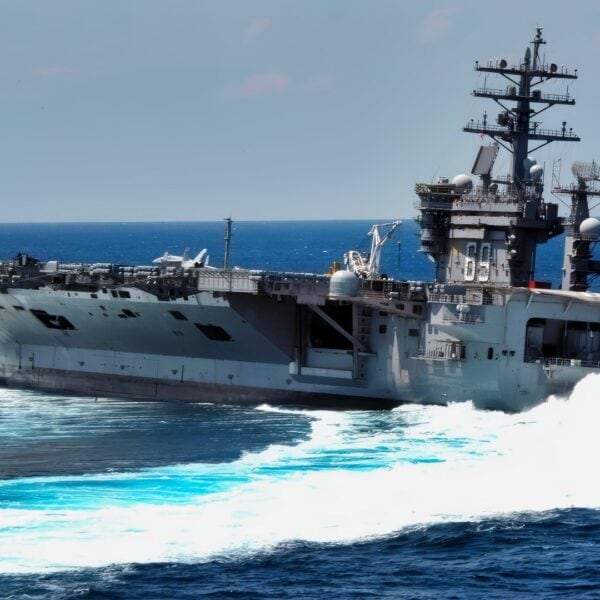 The Nimitz-class aircraft carrier USS Dwight D. Eisenhower conducts rudder turns during sea trials. Dwight D. Eisenhower completed a nine-month planned incremental availability at Norfolk Naval Ship Yard on June 10 and is scheduled to resume underway operations this summer.