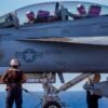 U.S. Navy Sailors prepare to taxi an EA-18G Growler, attached to Electronic Attack Squadron (VAQ) 133, on the flight deck of Nimitz-class aircraft carrier USS Abraham Lincoln (CVN 72) on Nov. 24, 2025. USS Abraham Lincoln (CVN 72), flagship of the Abraham Lincoln Carrier Strike Group, is underway conducting routine operations in the U.S. 3rd Fleet area of operations, demonstrating the U.S. Navy’s long-term commitment to a free and open Indo-Pacific. (U.S. Navy photo by Mass Communication Specialist Seaman Daniel Kimmelman)