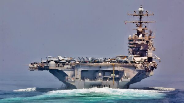 120511-N-WO496-003 STRAIT OF HORMUZ (May 11, 2012) Guided-missile cruiser USS Cape St. George (CG 71) and aircraft carrier USS Abraham Lincoln (CVN 72) transit the Strait of Hormuz. Both ships are deployed to the U.S. 5th Fleet area of responsibility conducting maritime security operations, theater security cooperation efforts and support missions as part of Operation Enduring Freedom. (U.S. Navy Photo by Mass Communication Specialist 3rd Class Alex R. Forster/Released)