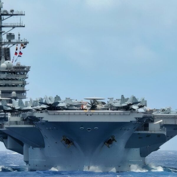 WESTERN PACIFIC (Nov. 12, 2017) The aircraft carrier USS Theodore Roosevelt (CVN 71) transits the Western Pacific during a three-carrier strike force photo exercise. The USS Ronald Reagan (CVN 76), USS Theodore Roosevelt (CVN 71) and USS Nimitz (CVN 68) Strike Groups are underway and conducting operations in international waters as part of a three-carrier strike force exercise. The U.S. Navy has patrolled the Indo-Asia Pacific region routinely for more than 70 years promoting regional security, stability and prosperity. (U.S. Navy photo by Mass Communication Specialist 3rd Class Kelsey J. Hockenberger/Released)