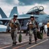 PACIFIC OCEAN (Jan. 24, 2026) – U.S. Navy Lt. Patrick Urrutia, left, and U.S. Navy Lt. Jg. Gabriela Patrick depart a U.S. Navy EA-18G Growler attached to Electronic Attack Squadron (VAQ) 129 on the flight deck of the Nimitz-class aircraft carrier USS Theodore Roosevelt (CVN 71), Jan. 24, 2026. Theodore Roosevelt, flagship of Carrier Strike Group (CSG) 9, is underway conducting exercises to bolster strike group readiness and capability in the U.S. 3rd Fleet area of operations. (U.S. Navy photo by Mass Communication Specialist Seaman Apprentice Cesar Nungaray)