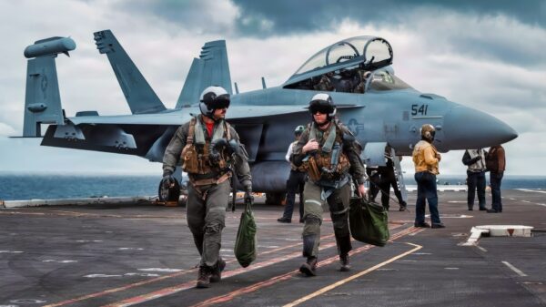 PACIFIC OCEAN (Jan. 24, 2026) – U.S. Navy Lt. Patrick Urrutia, left, and U.S. Navy Lt. Jg. Gabriela Patrick depart a U.S. Navy EA-18G Growler attached to Electronic Attack Squadron (VAQ) 129 on the flight deck of the Nimitz-class aircraft carrier USS Theodore Roosevelt (CVN 71), Jan. 24, 2026. Theodore Roosevelt, flagship of Carrier Strike Group (CSG) 9, is underway conducting exercises to bolster strike group readiness and capability in the U.S. 3rd Fleet area of operations. (U.S. Navy photo by Mass Communication Specialist Seaman Apprentice Cesar Nungaray)