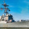 (Feb. 3, 2026) - The Arleigh Burke-class guided missile destroyer USS Truxtun (DDG 103) departed Naval Station Norfolk for a scheduled deployment on Feb. 3, 2026. The ship’s company includes approximately 300 Sailors, with an additional 26 embarked air wing personnel assigned to the “Valkyries” of Helicopter Maritime Strike Squadron 50. U.S. 2nd Fleet, reestablished in 2018 in response to the changing global security environment, develops and employs maritime ready forces to fight across multiple domains in the Atlantic and Arctic in order to ensure access, deter aggression and defend U.S., allied, and partner interests. (U.S. Navy photo by Mass Communication Specialist 2nd Class Derek Cole)
